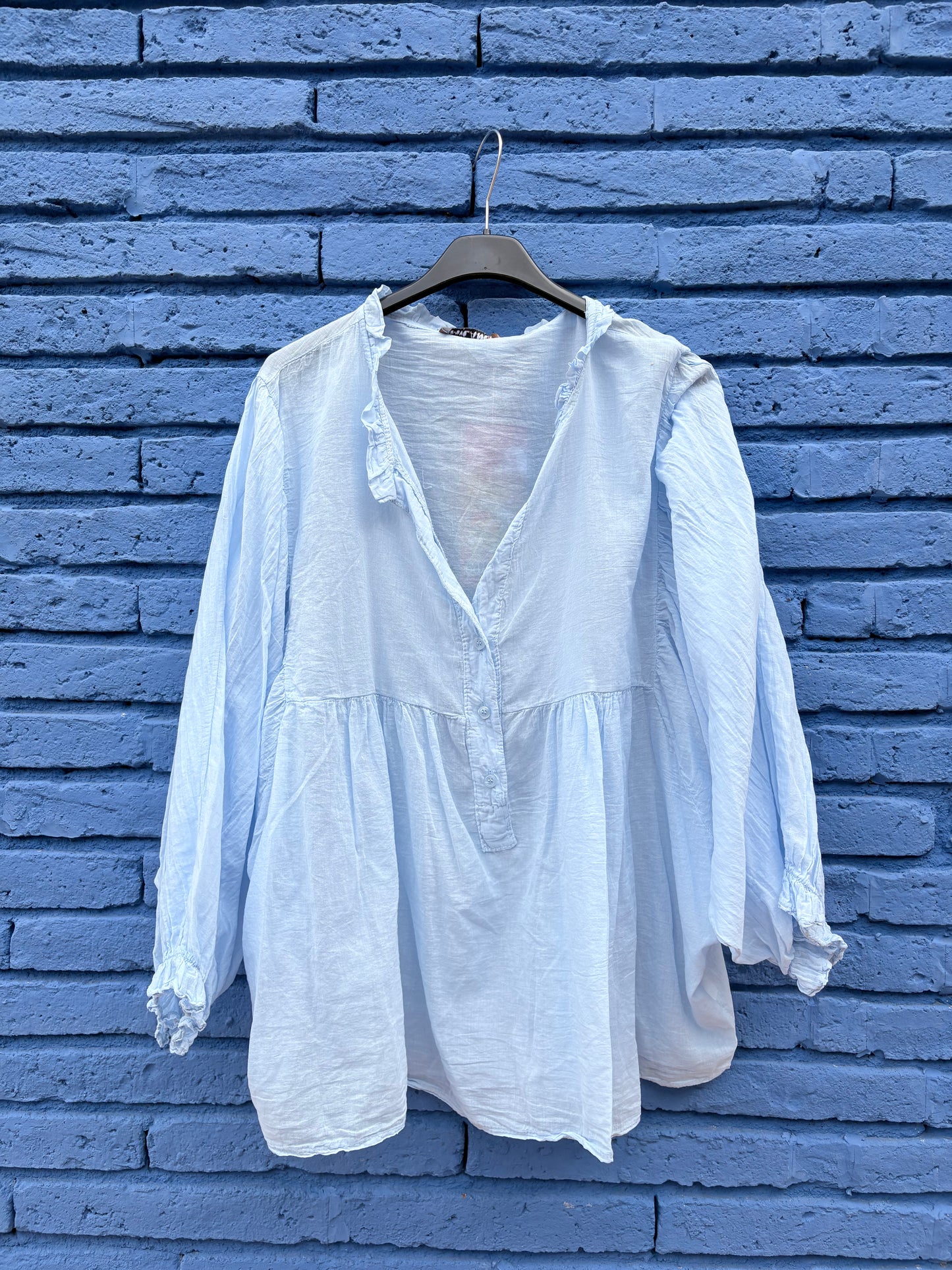 CAMISA CON VUELO